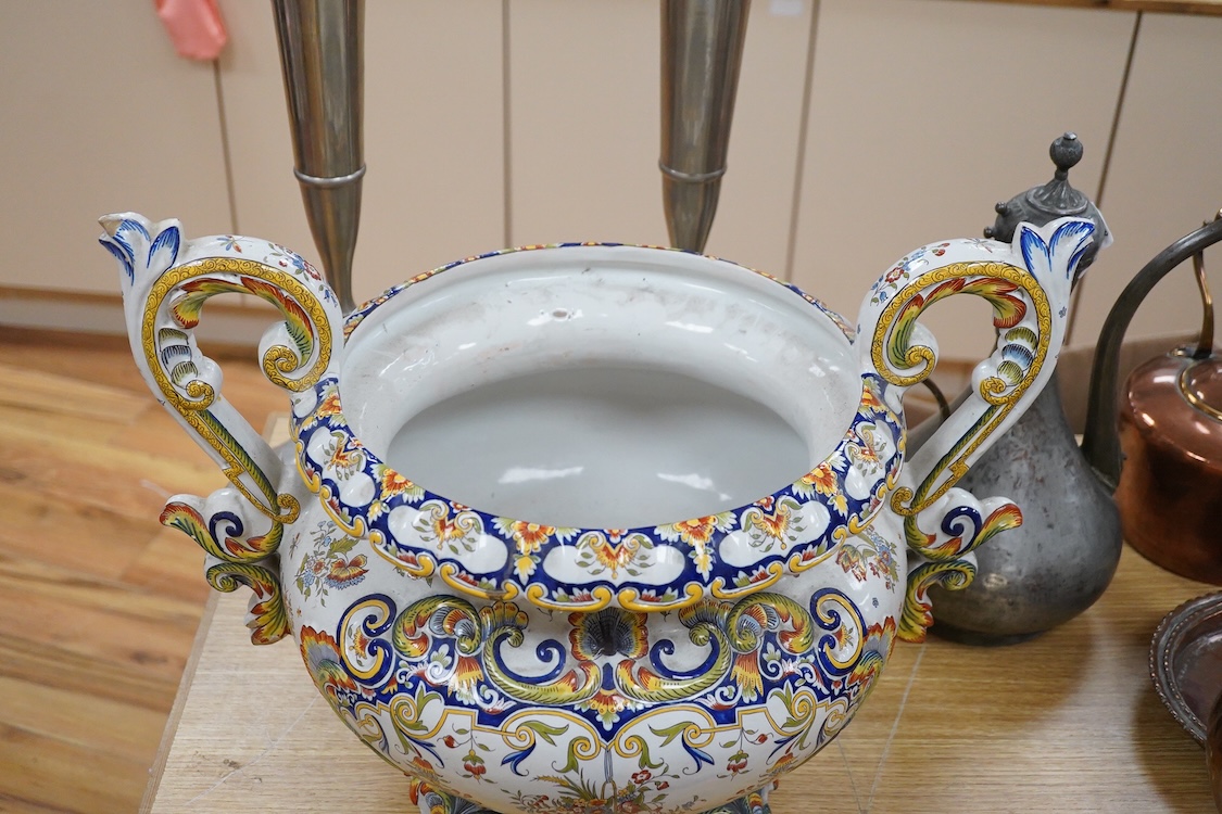A large ornate two handled French faience planter, 39cm high